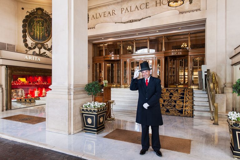 a man in a suit and a top hat